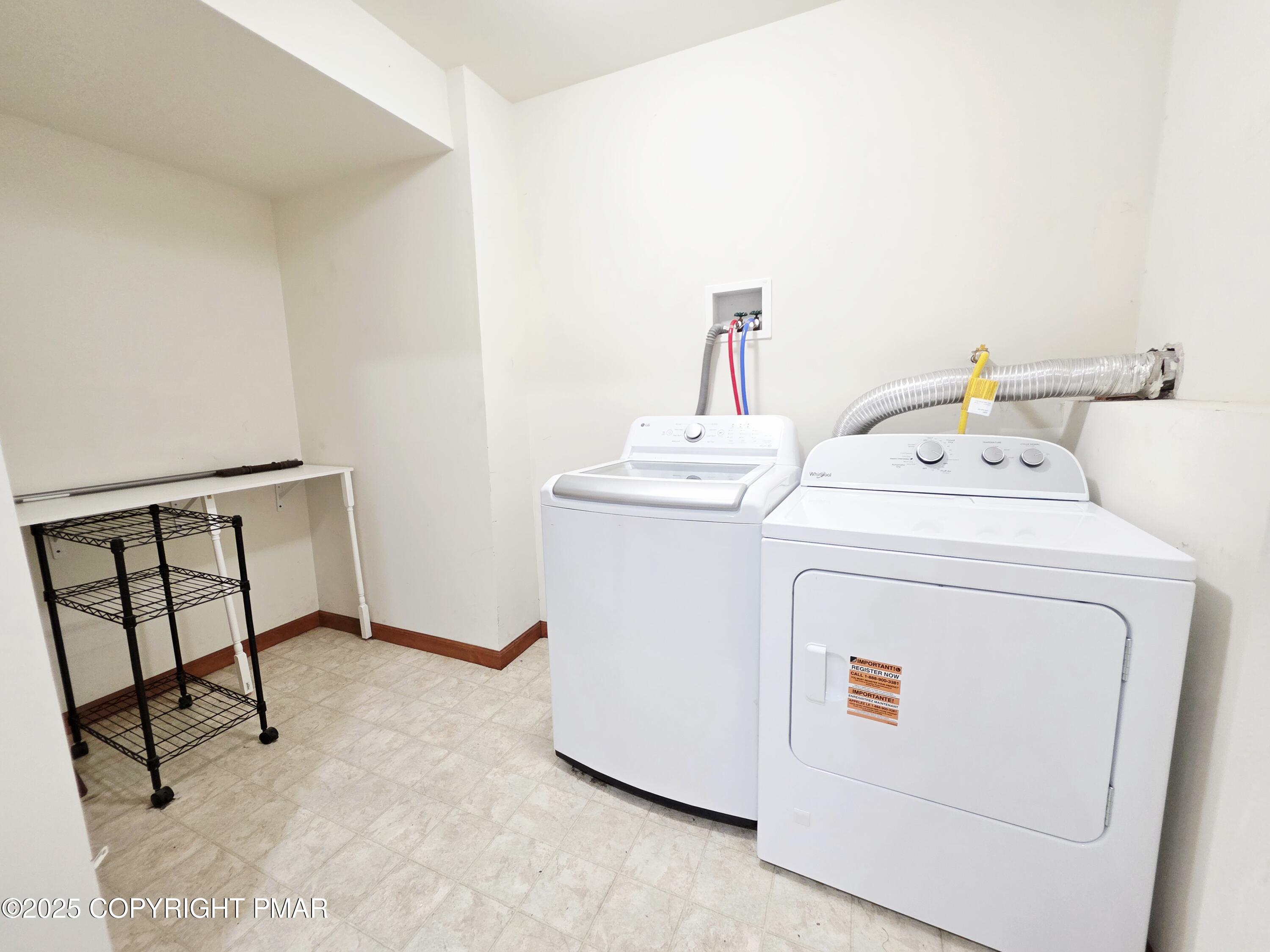 1001 Long Lake Road Tamiment, PA 18371 - Photo 26 of 38 a utility room with dryer and washer
