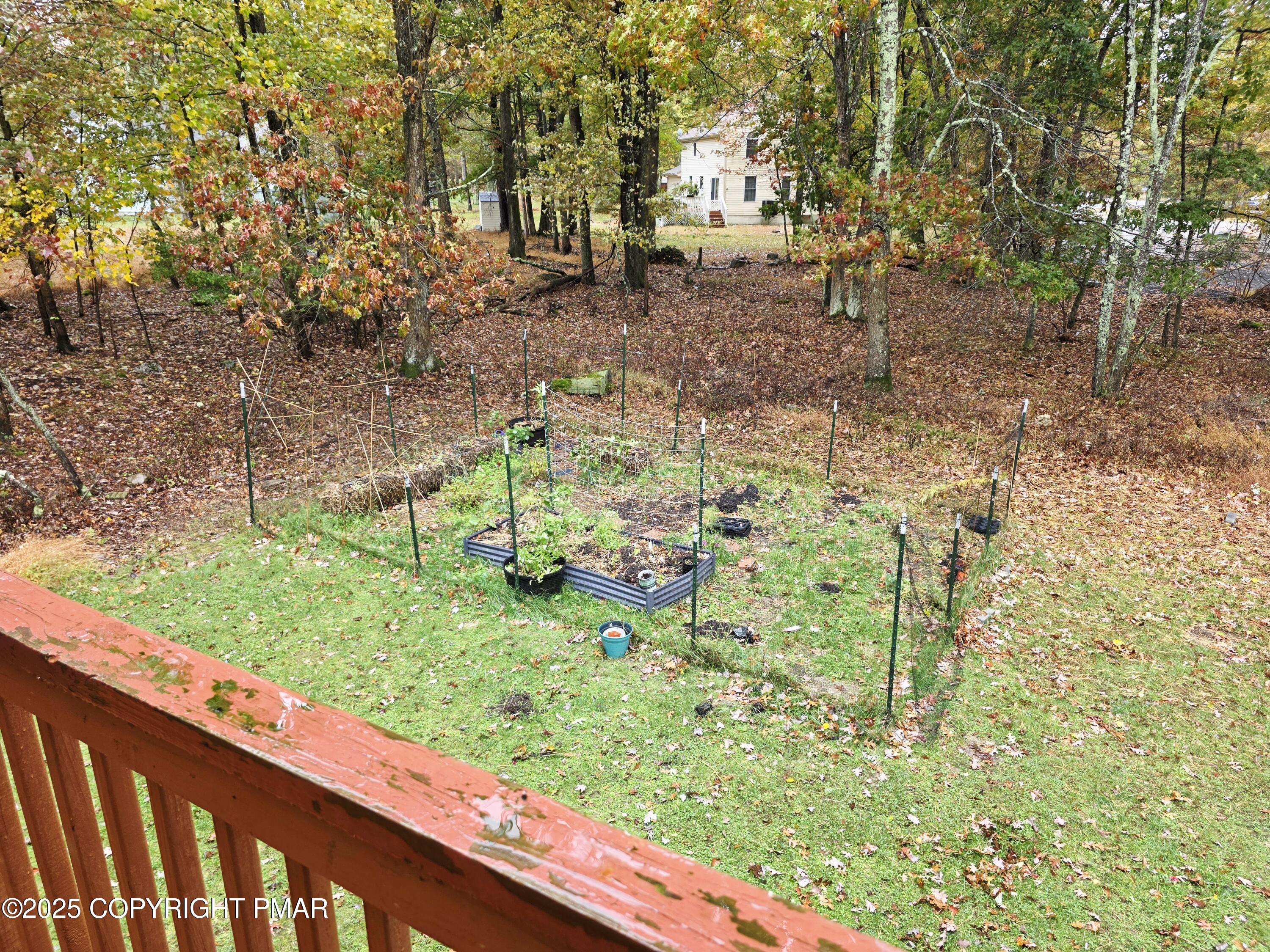 1001 Long Lake Road Tamiment, PA 18371 - Photo 29 of 38 a view of a yard with wooden fence