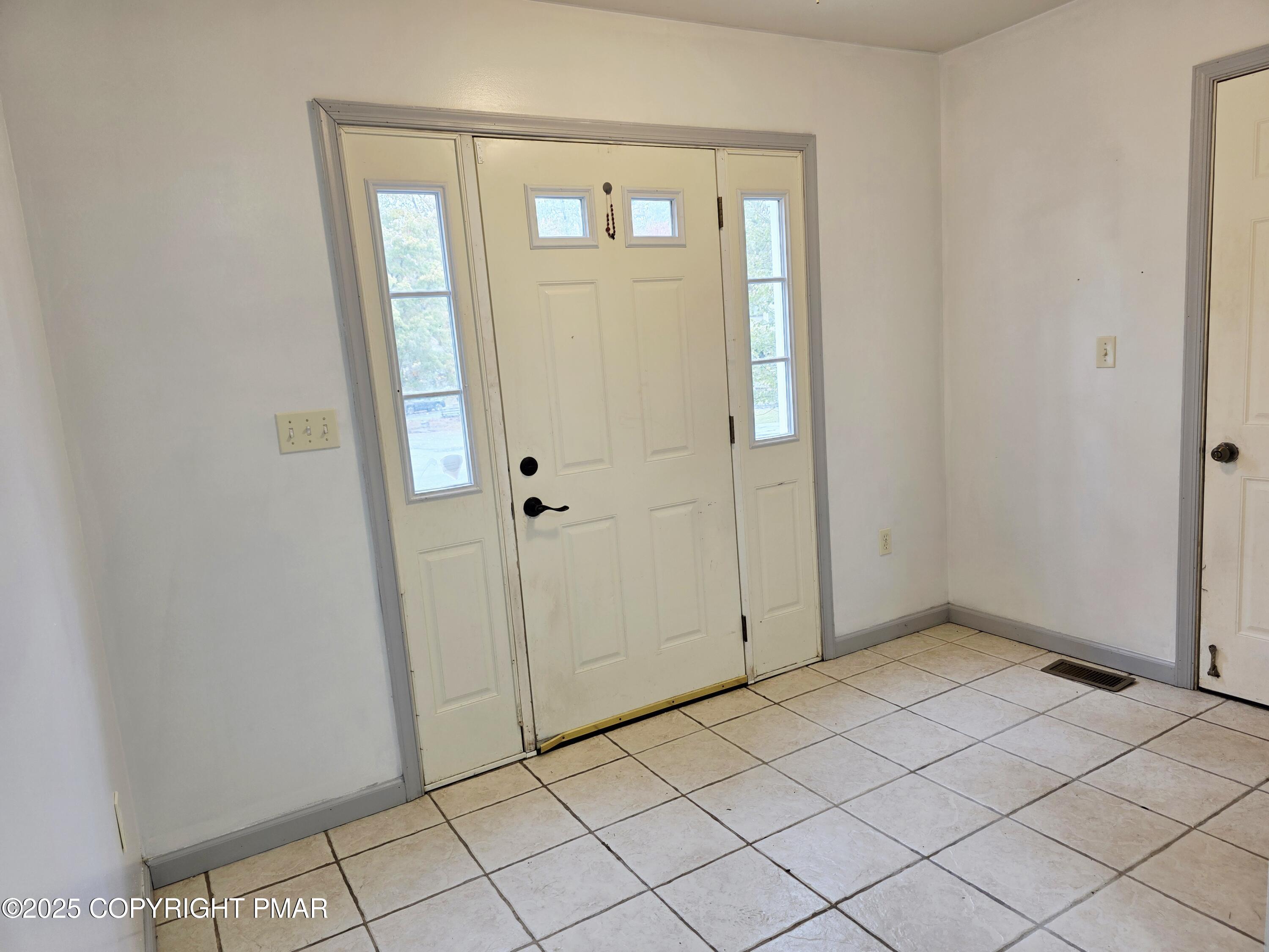 1001 Long Lake Road Tamiment, PA 18371 - Photo 3 of 38 a view of an empty room
