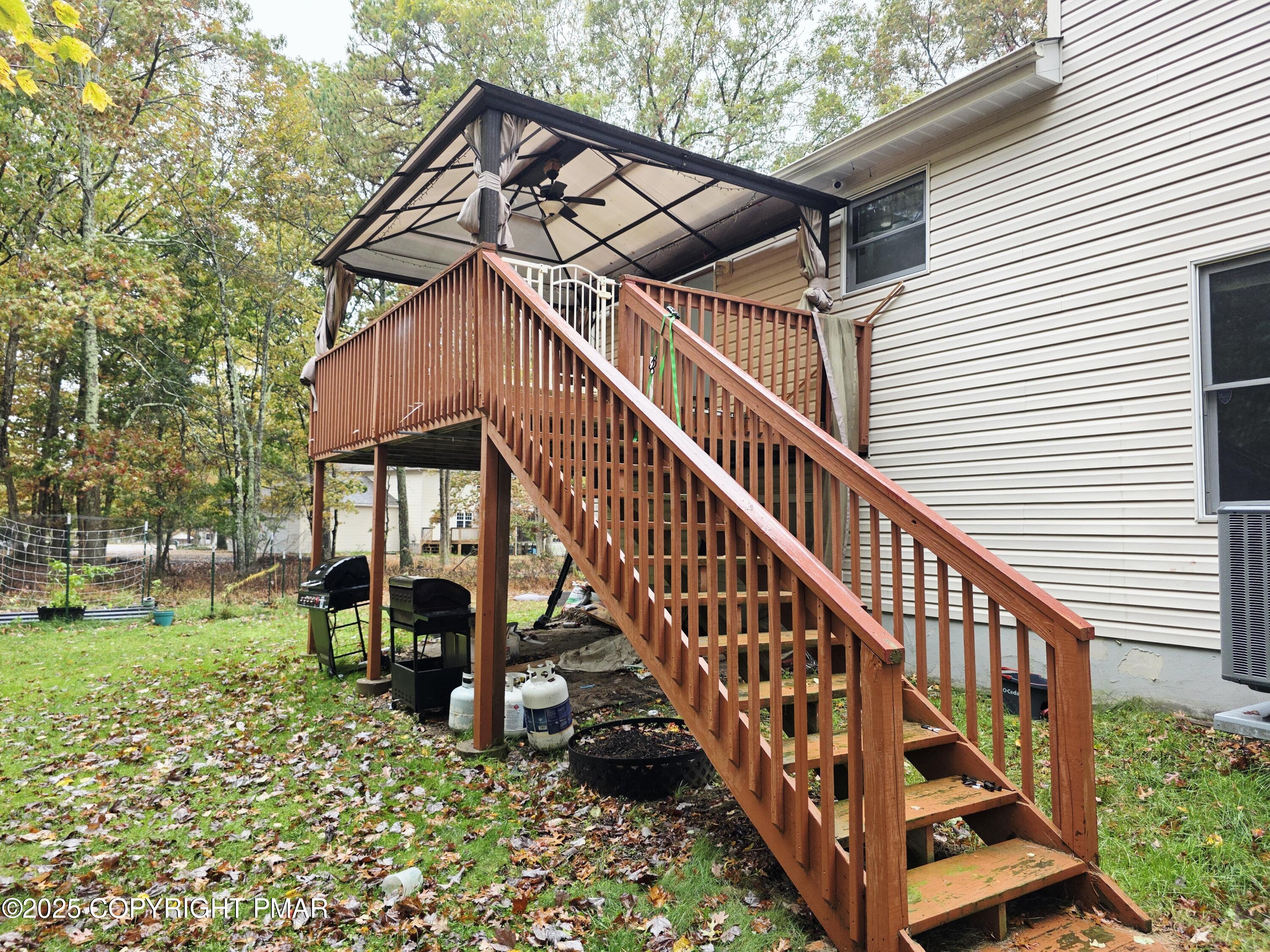 1001 Long Lake Road Tamiment, PA 18371 - Photo 31 of 38 a view of a house with a deck