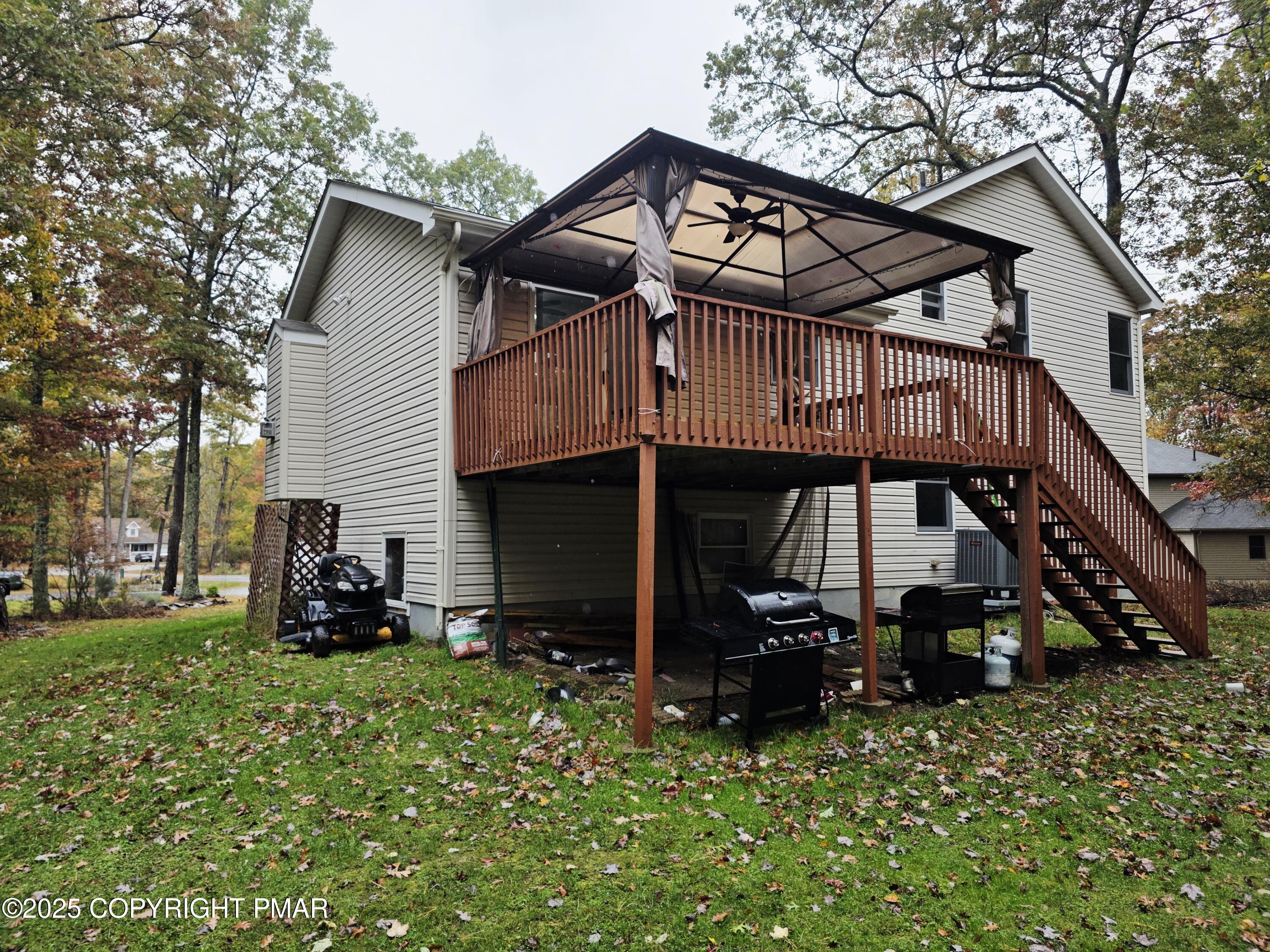 1001 Long Lake Road Tamiment, PA 18371 - Photo 32 of 38 a view of a house with a yard
