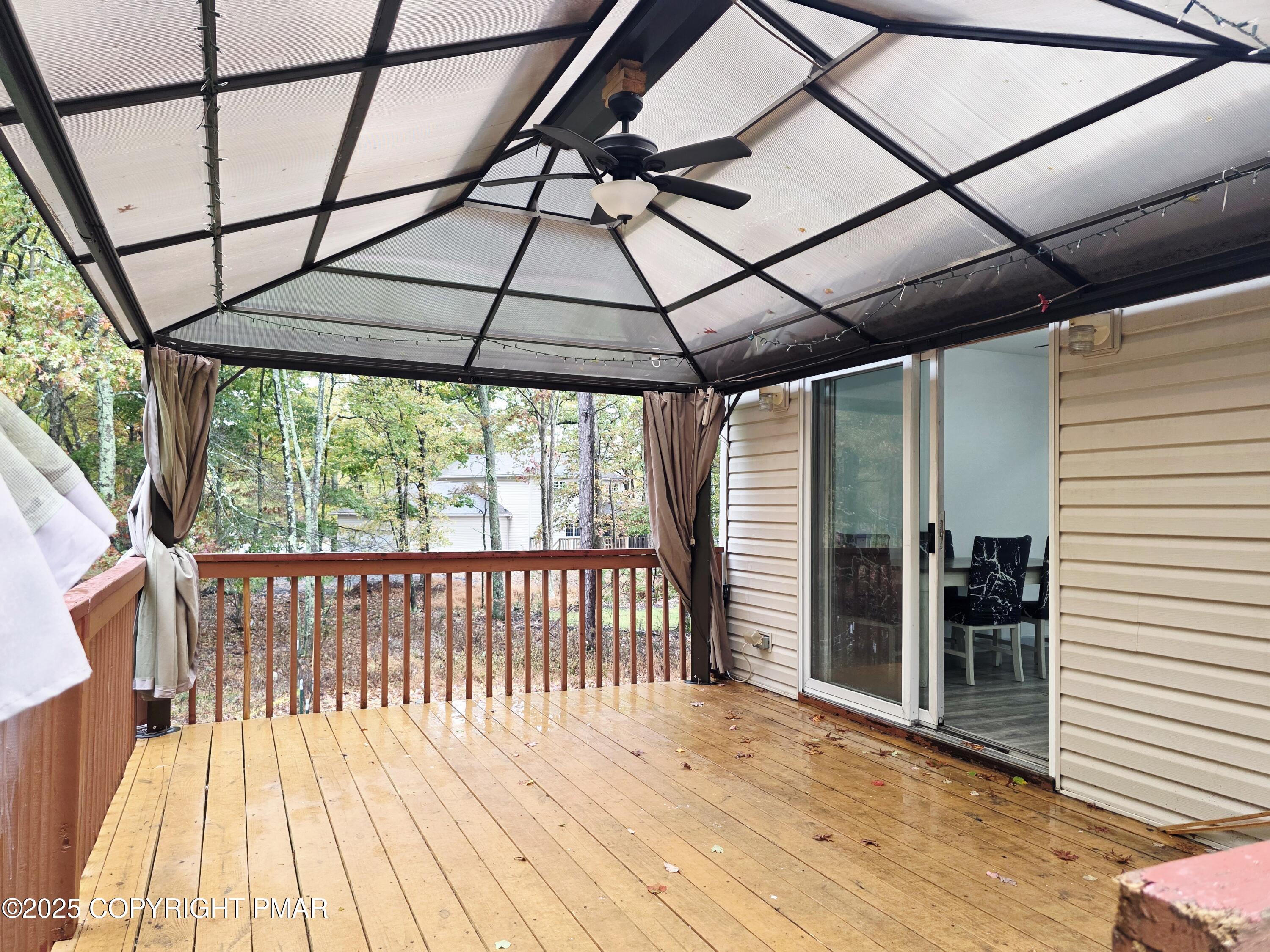1001 Long Lake Road Tamiment, PA 18371 - Photo 33 of 38 a view of a balcony with wooden floor