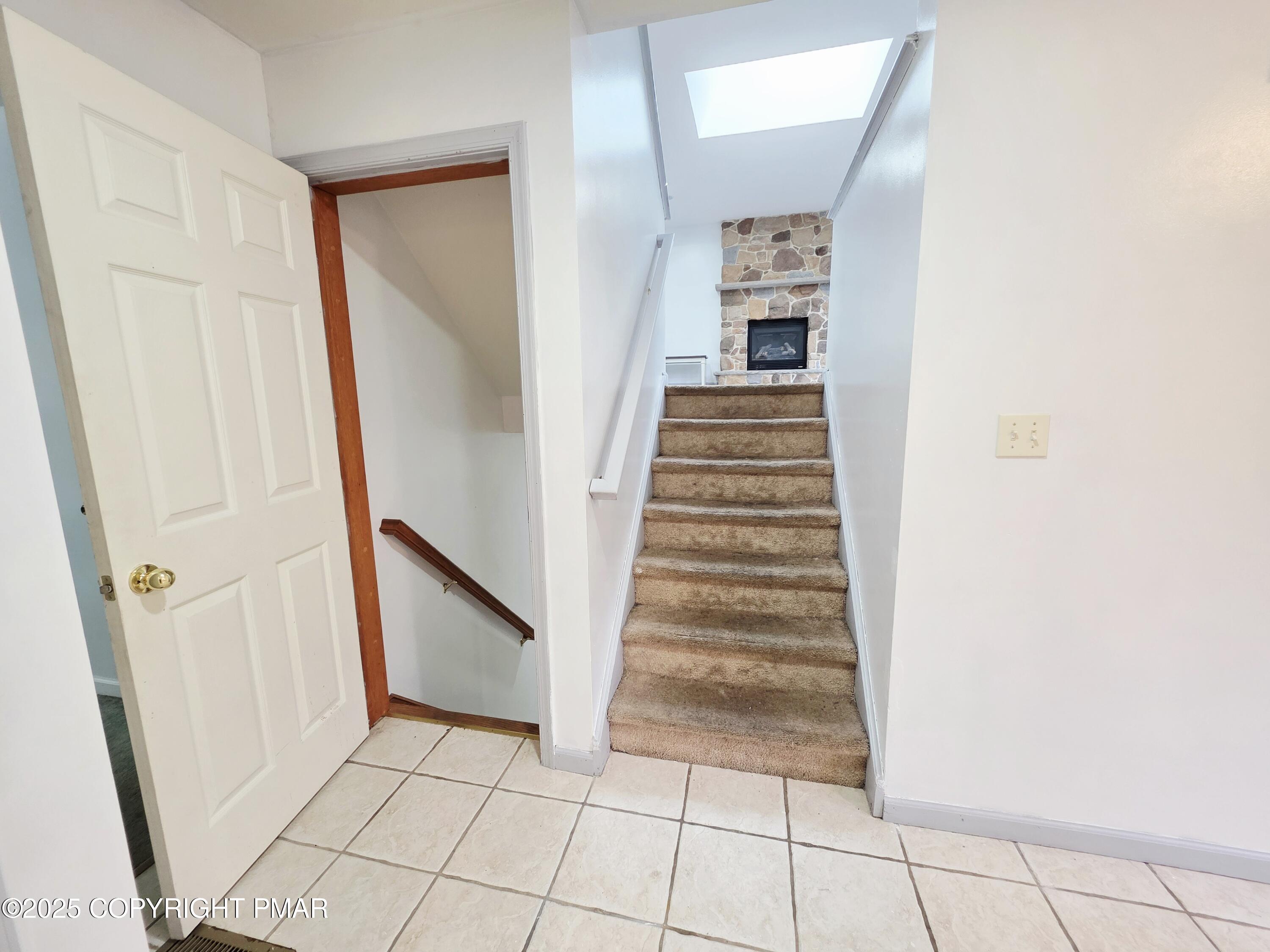1001 Long Lake Road Tamiment, PA 18371 - Photo 7 of 38 a view of an entryway with staircase
