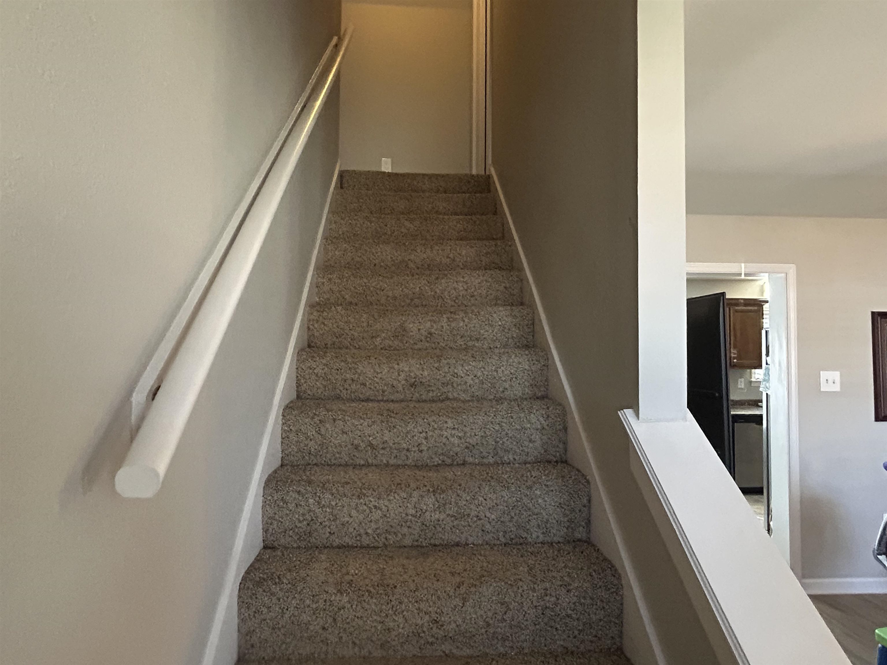 1535 Roane Street Covington, TN 38019 - Photo 17 of 25 Stairway with baseboards