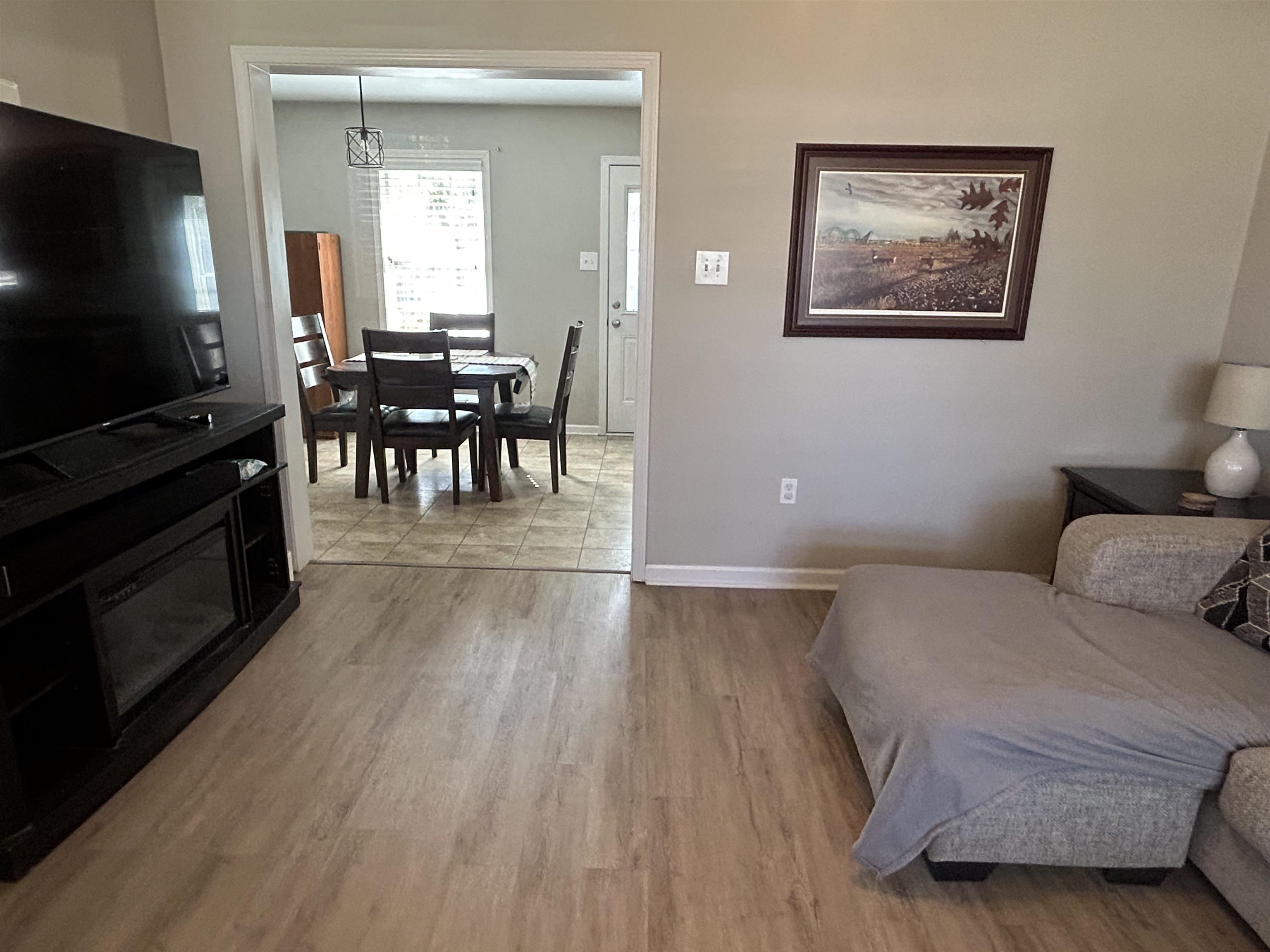 1535 Roane Street Covington, TN 38019 - Photo 8 of 25 Living room with light wood-type flooring