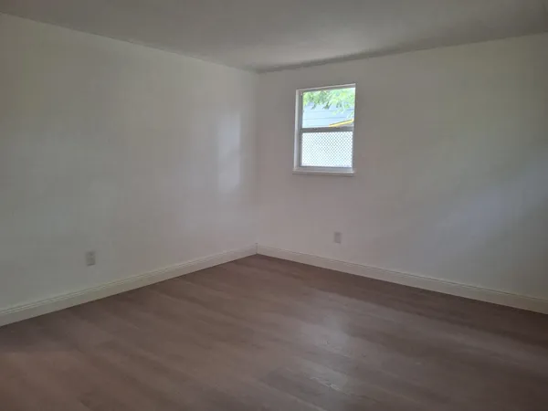 an empty room with a window