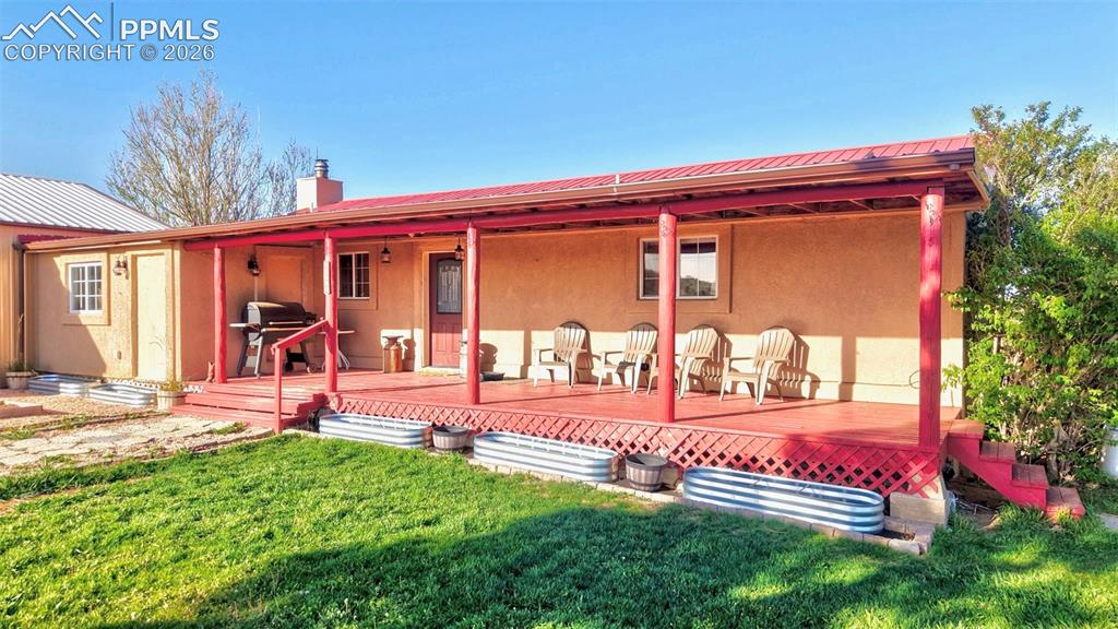 a view of a backyard with a patio