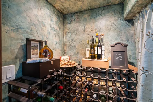 a bed room with a bed and a chandelier