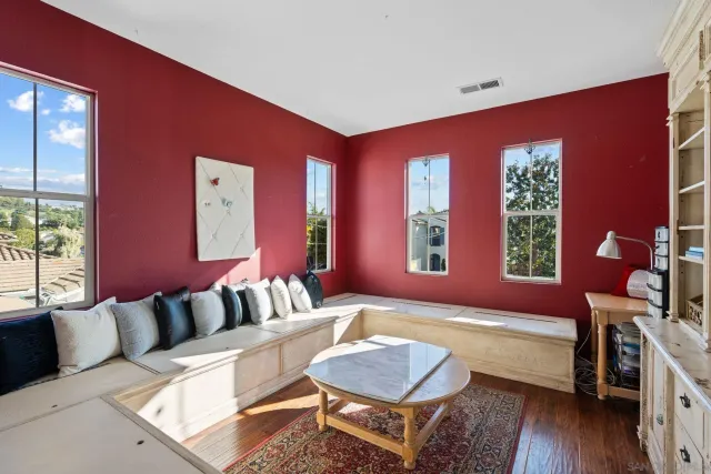 a view of backyard with outdoor seating a patio and plants