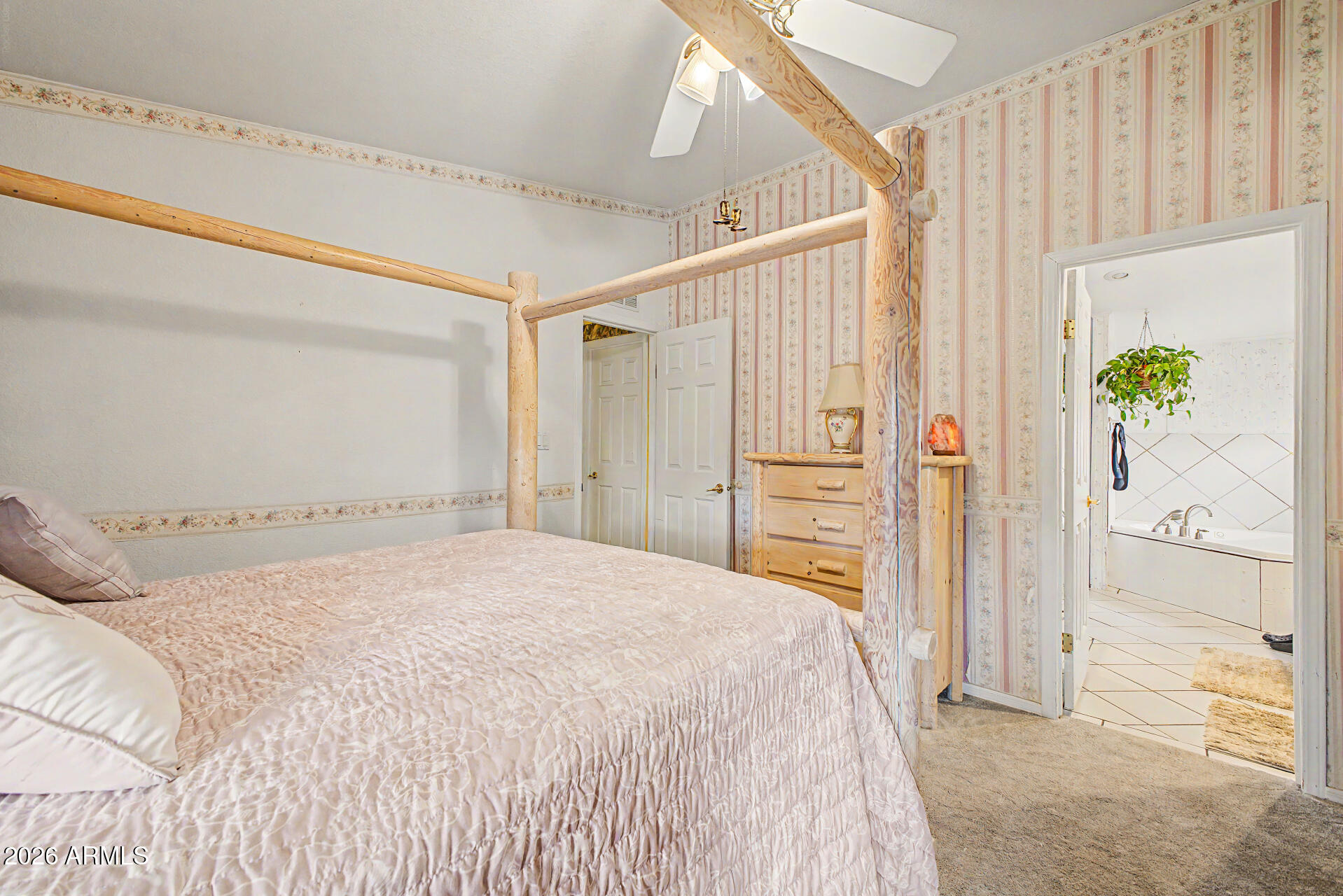 2548 South Val Vista Road Apache Junction, AZ 85119 - Photo 23 of 29 a spacious bedroom with a bed and a shower