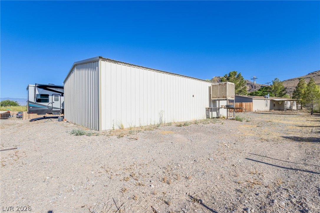 220 Raleigh Lane Indian Springs, NV 89018 - Photo 41 of 43 Workshop has Industrial Evap Cooling unit