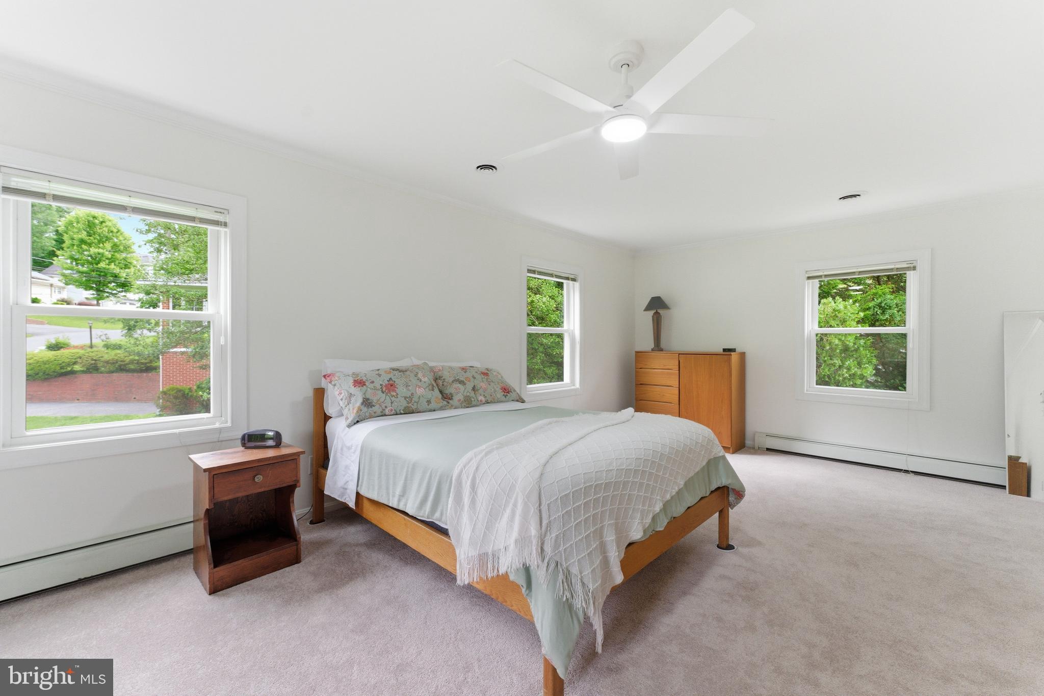 2100 Edgewater Parkway Silver Spring, MD 20903 - Photo 32 of 46 a bedroom with a bed and a large window