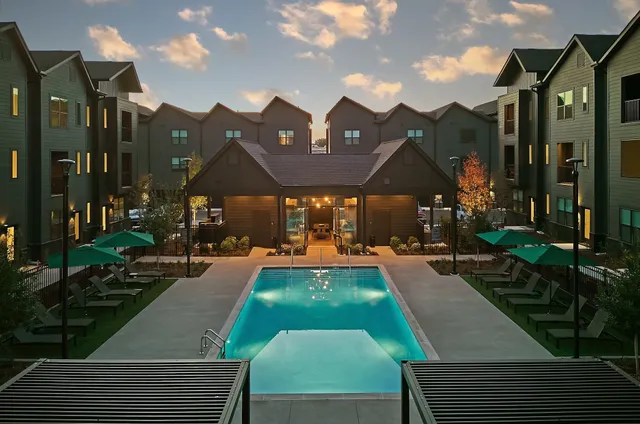 a view of a house with a swimming pool