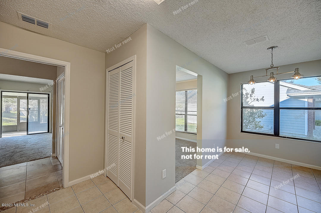 8864 Cherry Hill Drive Jacksonville, FL 32221 - Photo 15 of 17 a view of a room that has a window in it