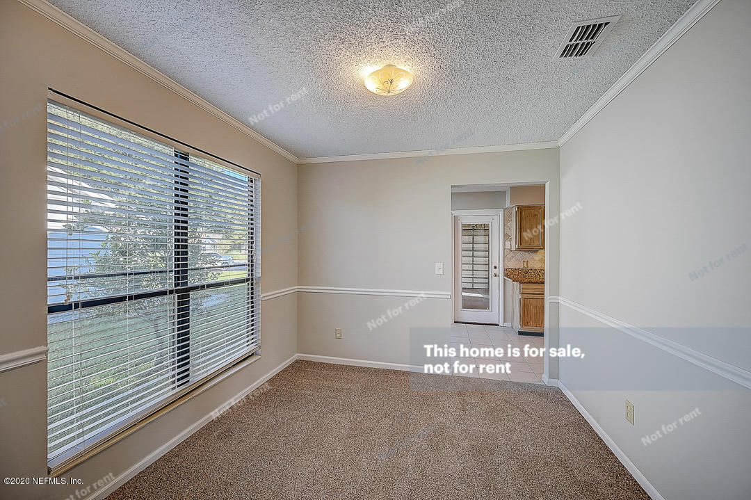 8864 Cherry Hill Drive Jacksonville, FL 32221 - Photo 17 of 17 a view of a room that has a window