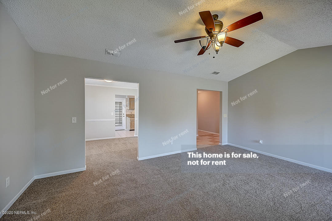8864 Cherry Hill Drive Jacksonville, FL 32221 - Photo 6 of 17 a view of an empty room