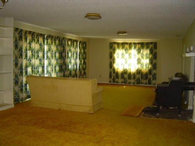 232 Byards Point Road Sedgwick, ME 04673 - Photo 10 of 31 The living/dining room has a wood...