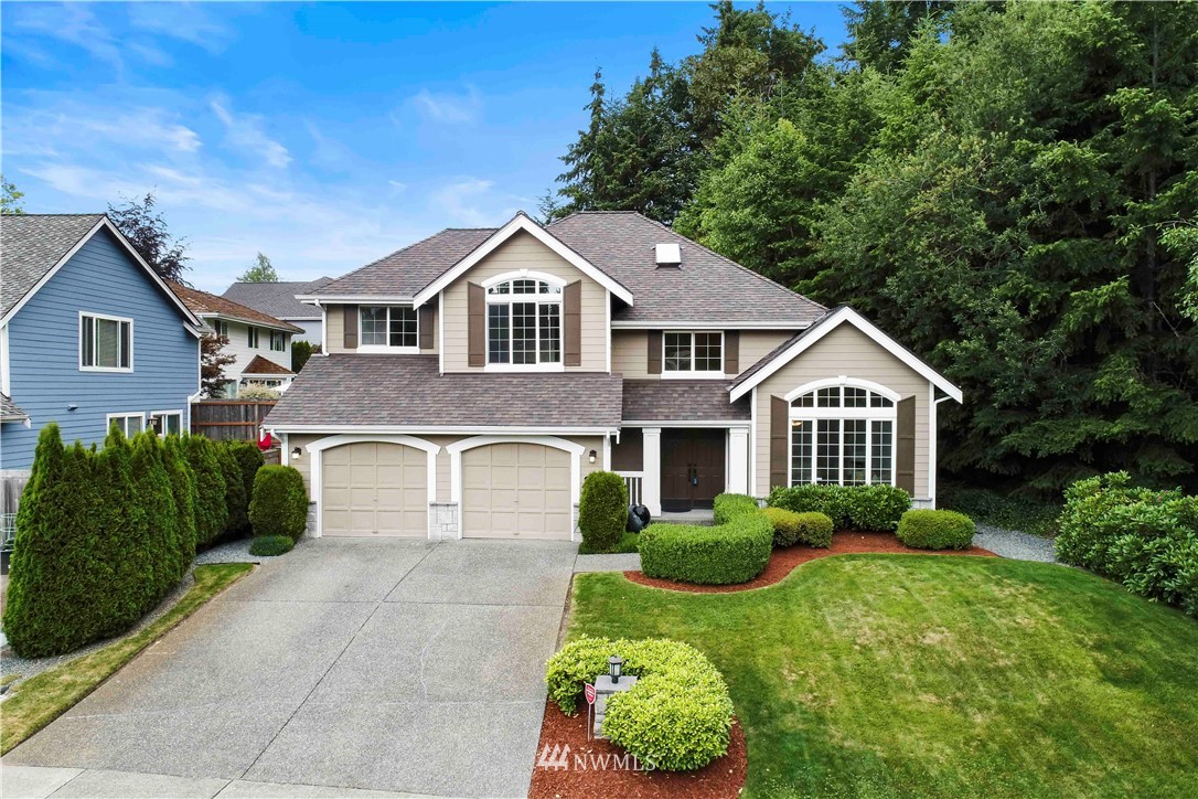 2919 204th Street Southeast Bothell, WA 98012 - Photo 1 of 1 a front view of a house with a yard
