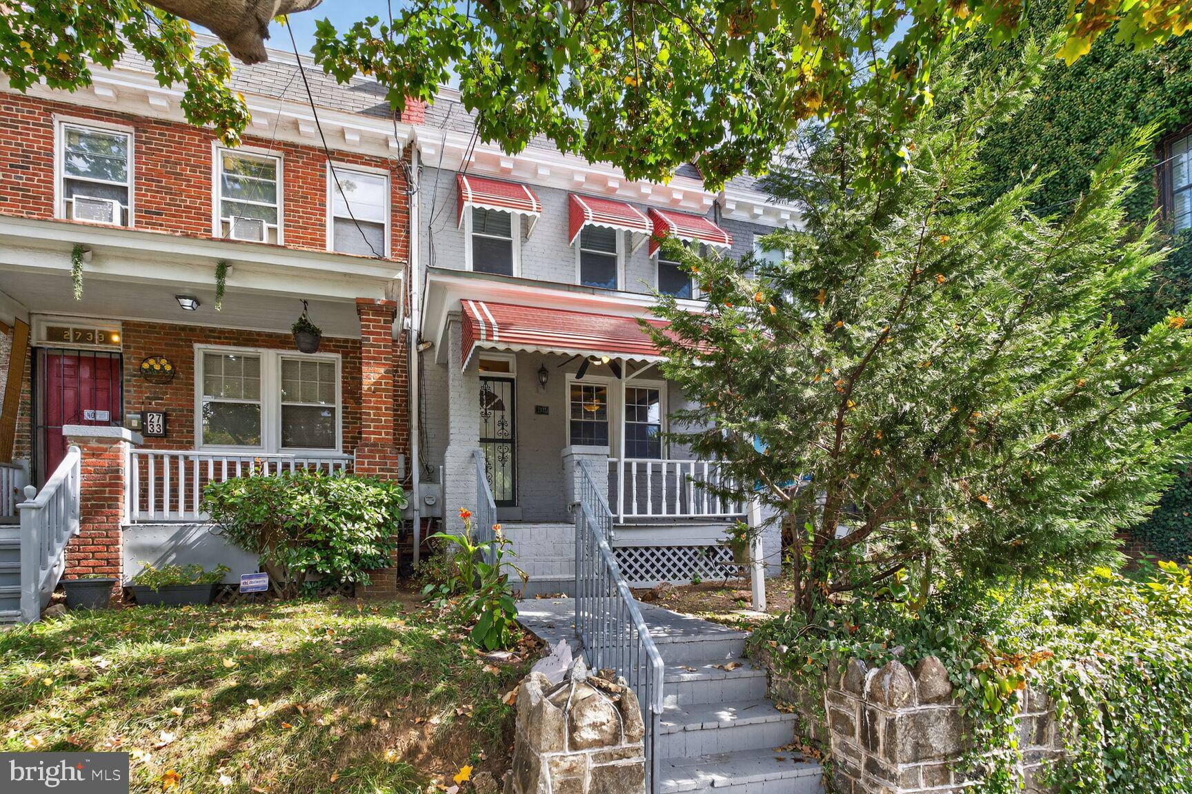 2731 4th Street Northeast Washington, DC 20002 - Photo 1 of 20 front view of a house with a yard