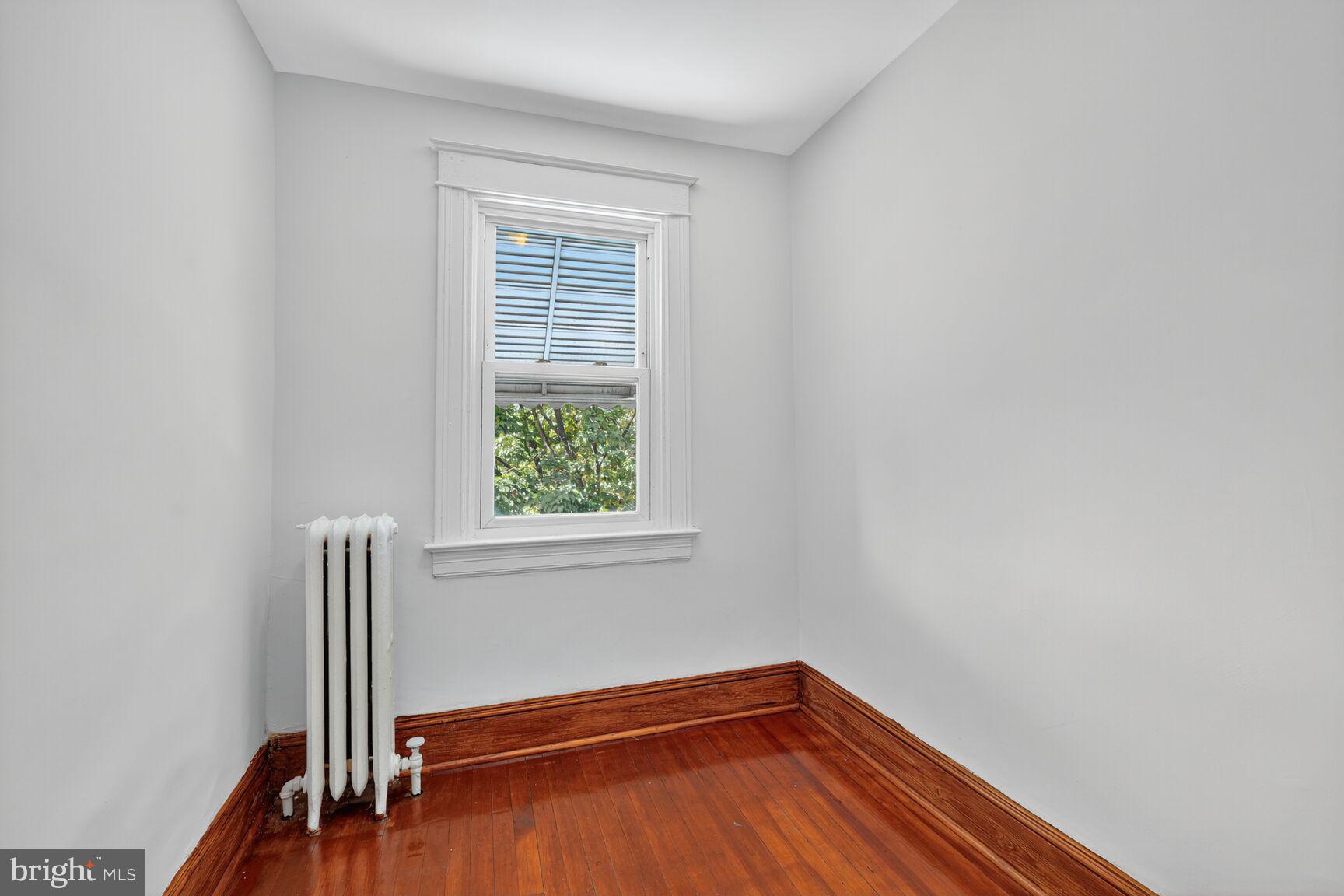 2731 4th Street Northeast Washington, DC 20002 - Photo 13 of 20 a view of a room with wooden floor and a window