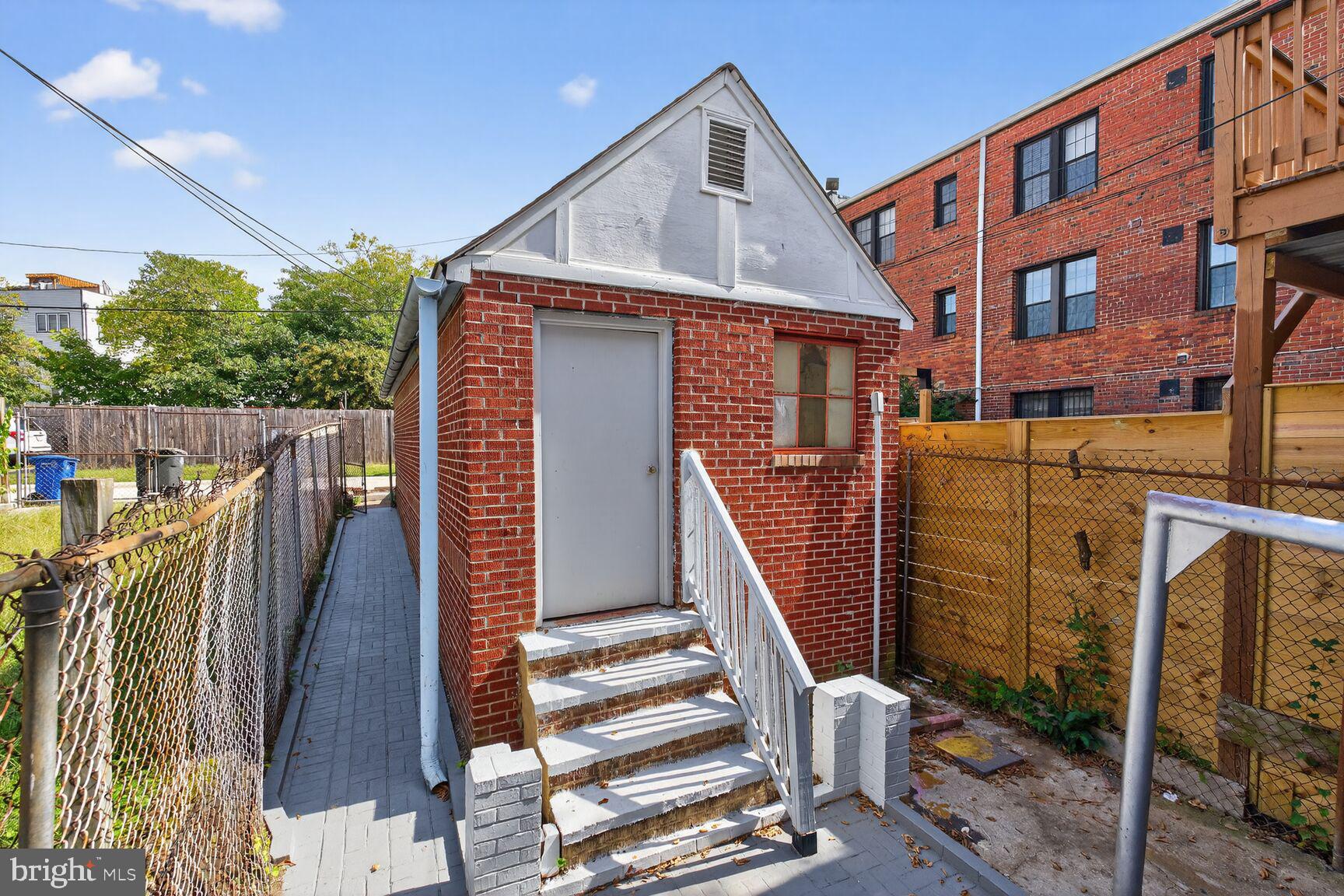 2731 4th Street Northeast Washington, DC 20002 - Photo 18 of 20 a view of a balcony with wooden floor and fence