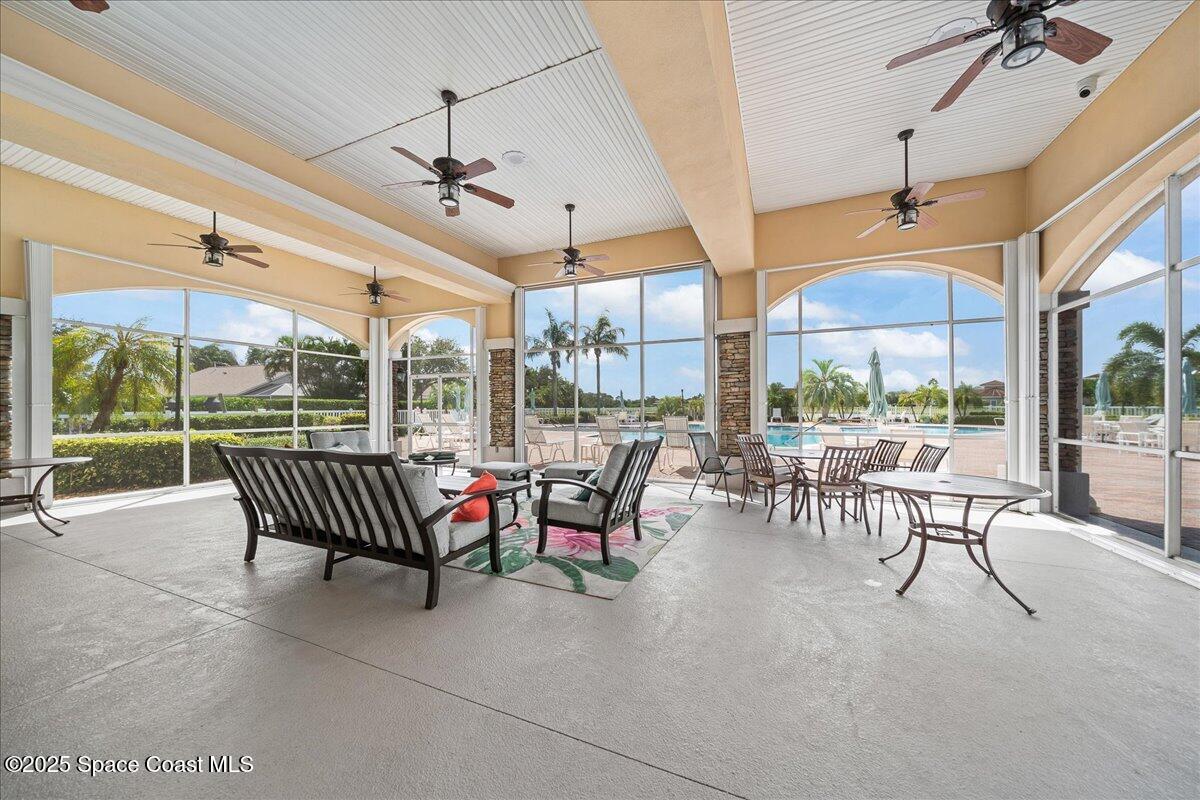 1404 Boca Rio Drive Melbourne, FL 32940 - Photo 36 of 53 a outdoor space with lots of tables and chairs