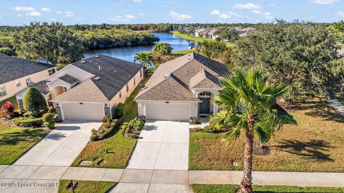 1404 Boca Rio Drive Melbourne, FL 32940 - Photo 4 of 53 an aerial view of a house with a yard