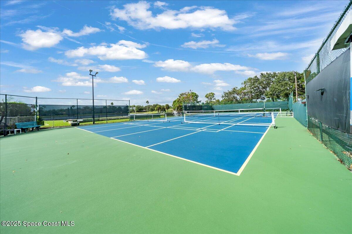 1404 Boca Rio Drive Melbourne, FL 32940 - Photo 42 of 53 a view of an outdoor space and tennis court