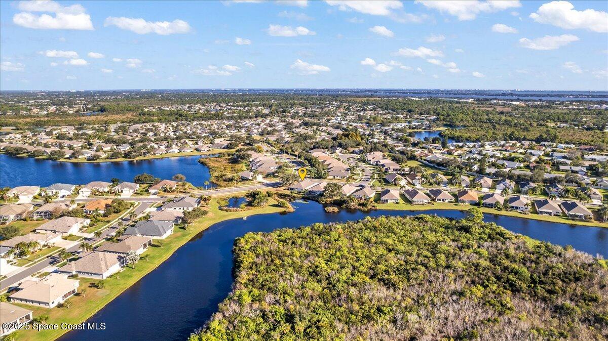1404 Boca Rio Drive Melbourne, FL 32940 - Photo 52 of 53 an aerial view of residential houses with outdoor space