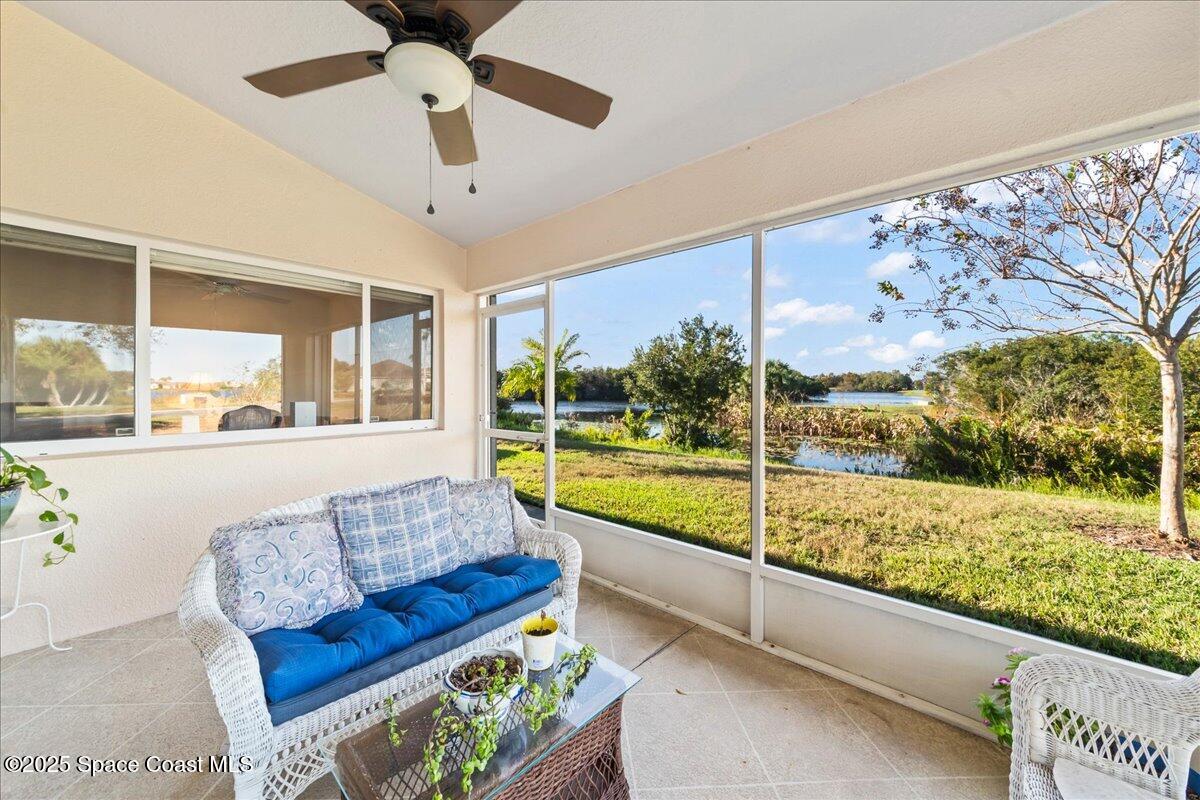 1404 Boca Rio Drive Melbourne, FL 32940 - Photo 10 of 53 a living room with large window and a table