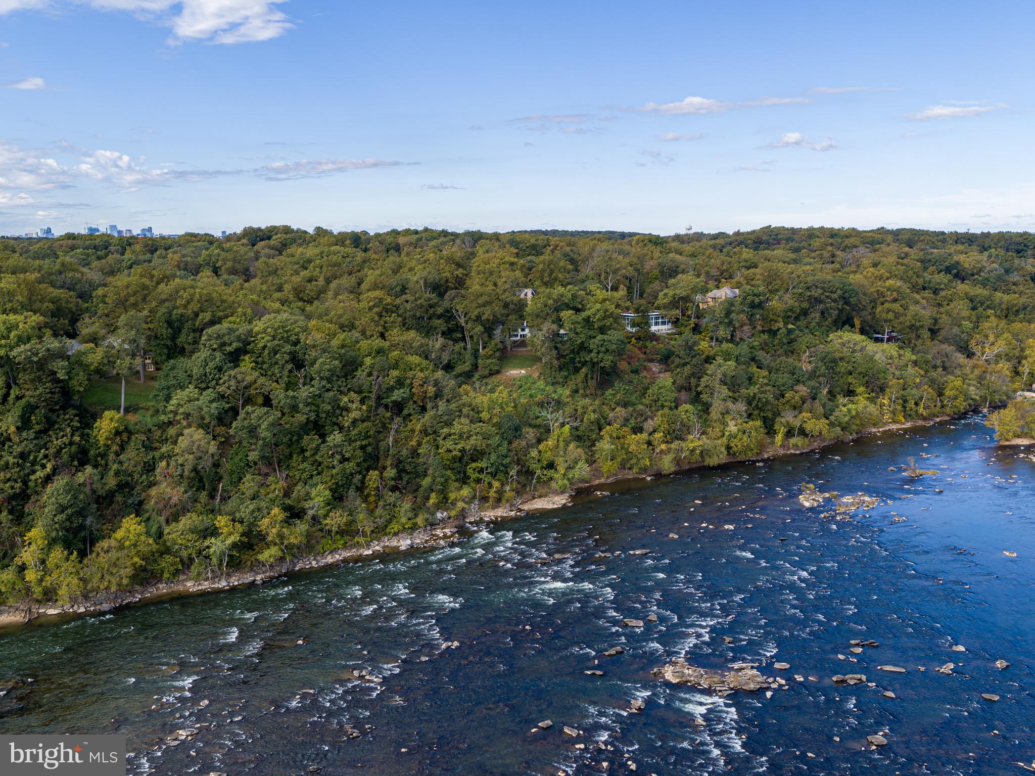 1175 Crest Lane McLean, VA 22101 - Photo 1 of 13 a view of a field with an trees