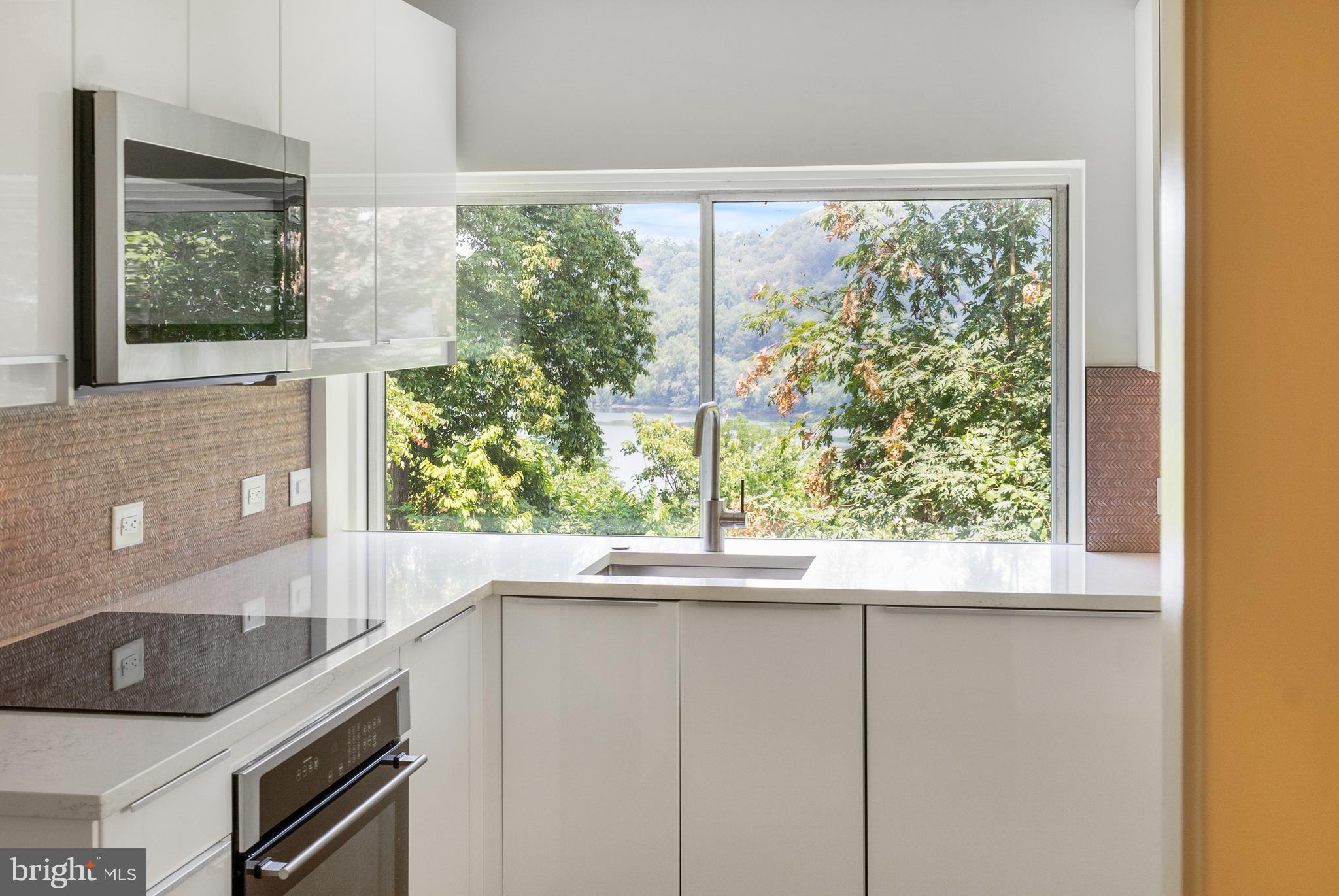 1175 Crest Lane McLean, VA 22101 - Photo 10 of 13 a kitchen with a sink and large window