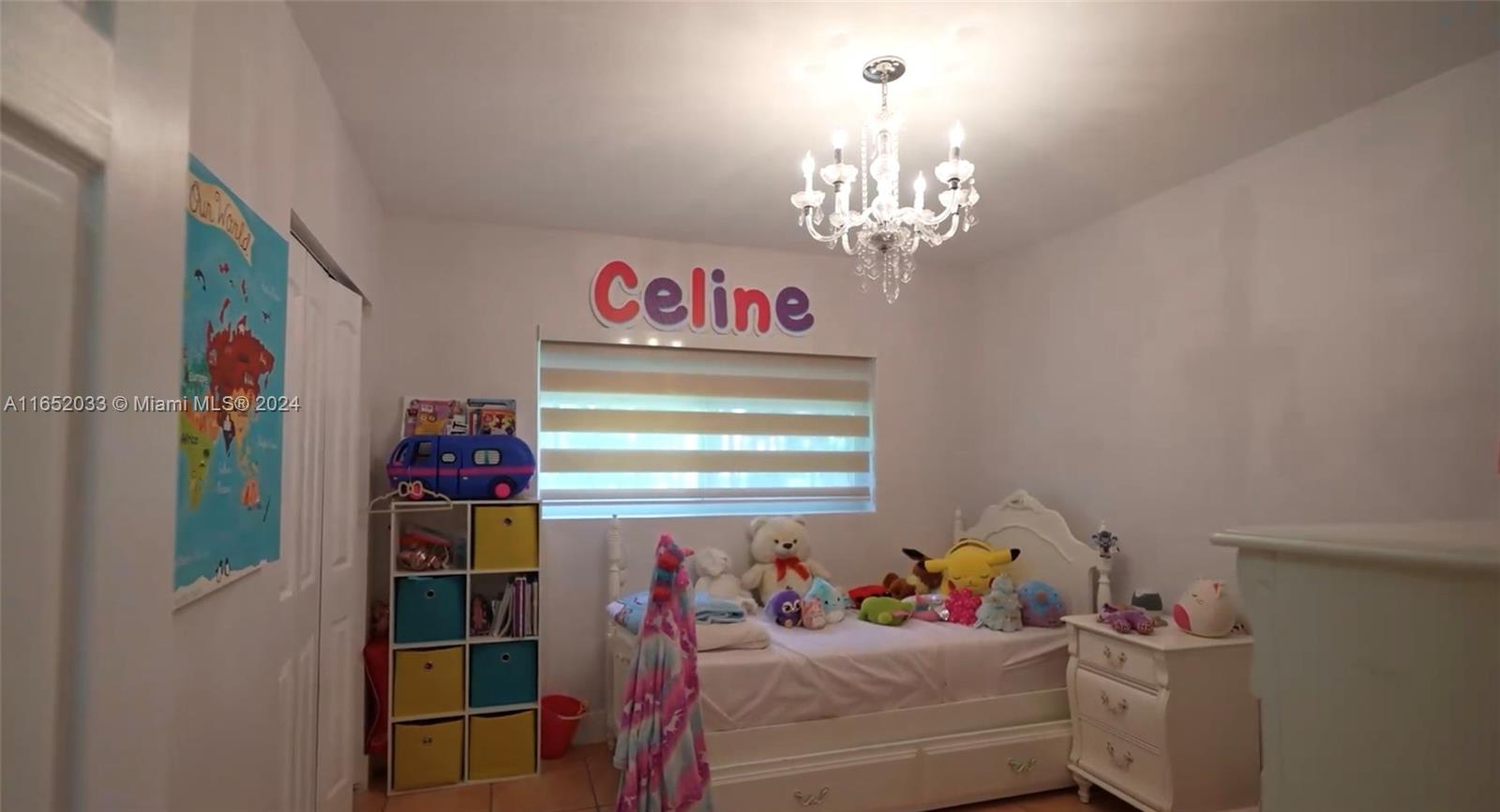 11866 Southwest 43rd Street Miami, FL 33175 - Photo 13 of 64 a bedroom with a bed and a window