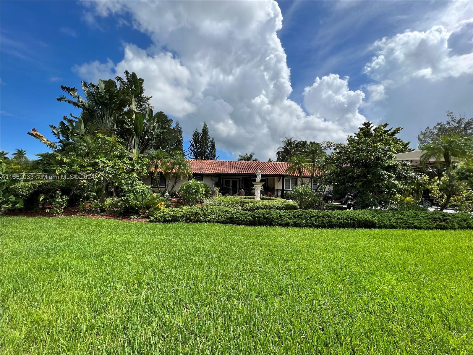 11866 Southwest 43rd Street Miami, FL 33175 - Photo 19 of 64 a view of a garden