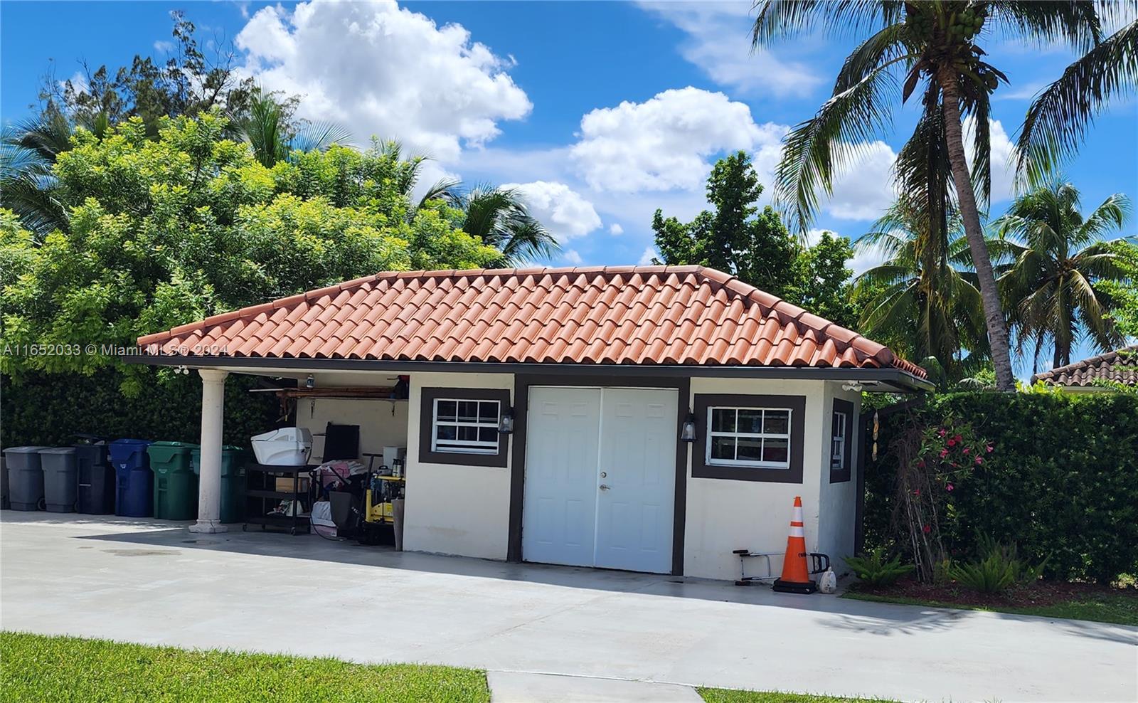 11866 Southwest 43rd Street Miami, FL 33175 - Photo 34 of 64 a front view of a house