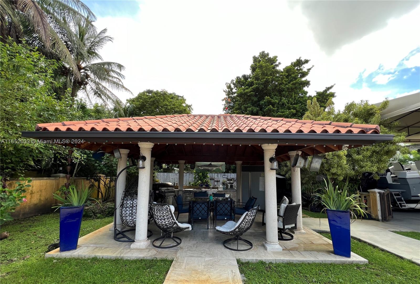 11866 Southwest 43rd Street Miami, FL 33175 - Photo 52 of 64 a view of a chairs and table in patio