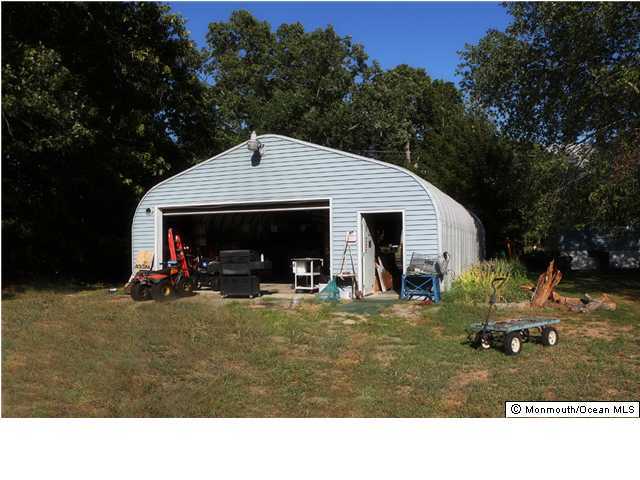 143 Lanes Pond Road Howell, NJ 07731 - Photo 3 of 3 a view of a house with backyard