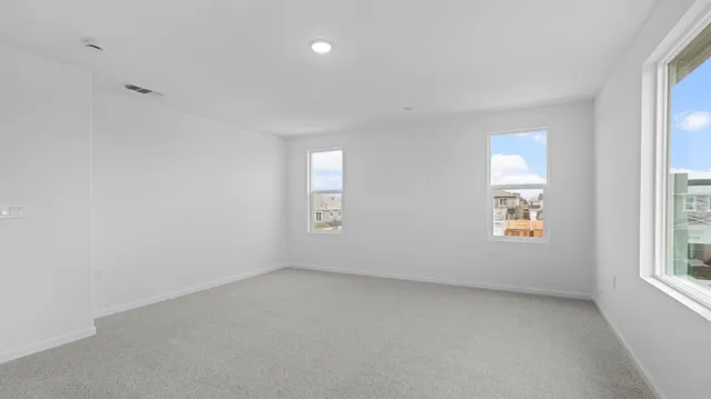 an empty room with windows