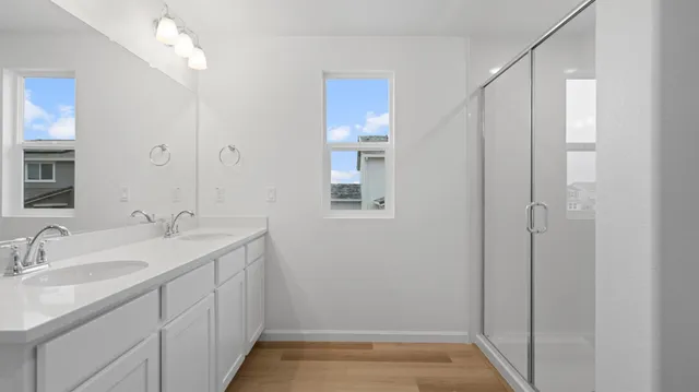 a bathroom with a sink and mirror