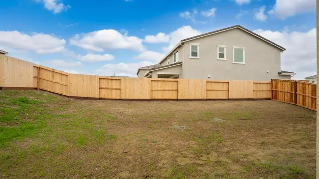 a view of an empty room with basketball court