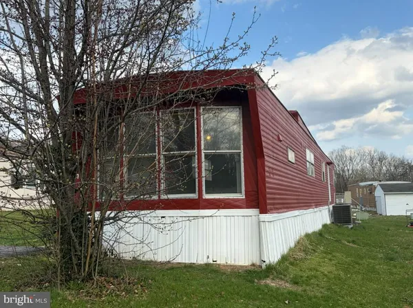 a front view of house with yard