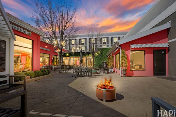 a view of a street with cars