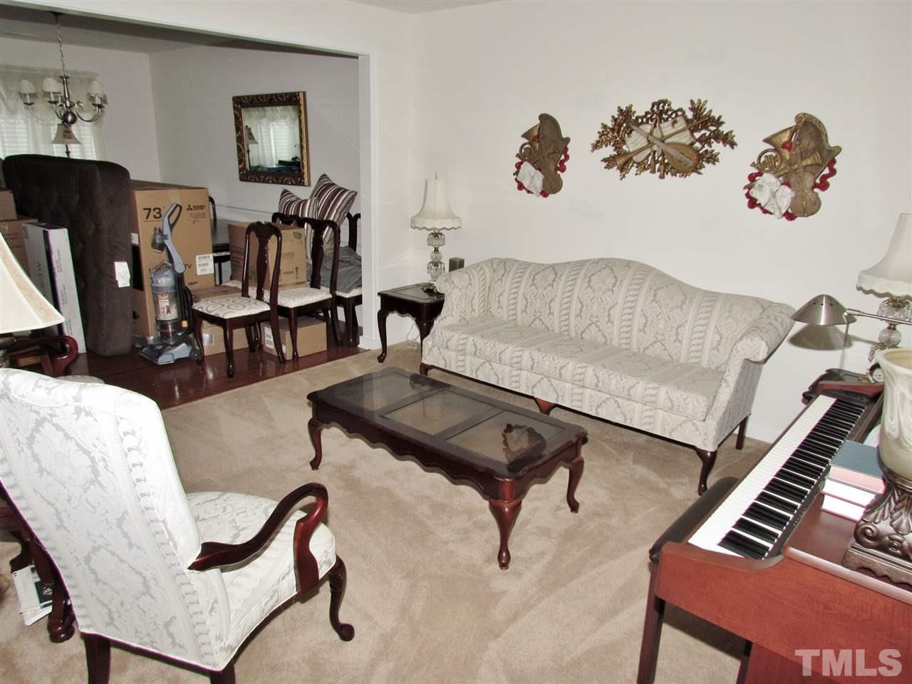 5200 Chasteal Trail Raleigh, NC 27610 - Photo 3 of 25 a living room with furniture