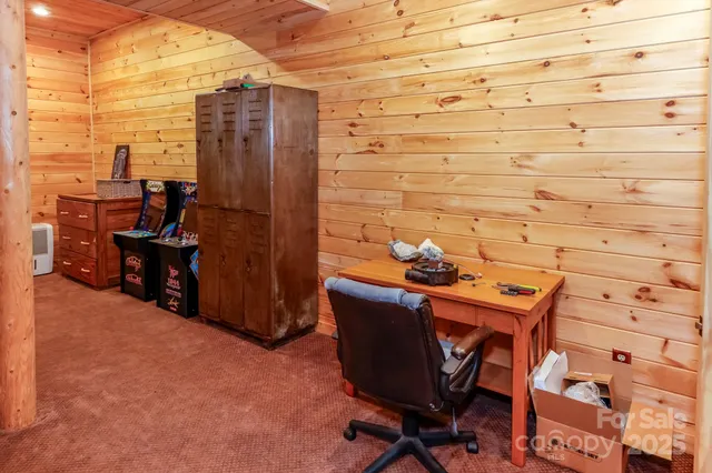 a balcony with table and chairs