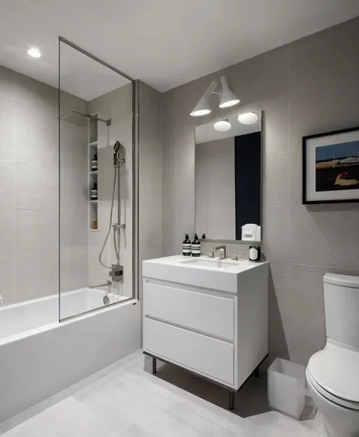 a bathroom with a tub sink and mirror