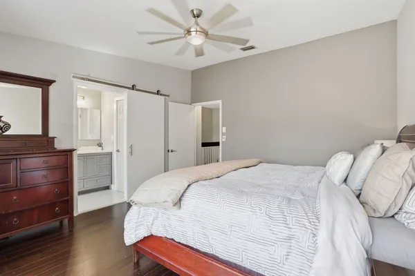 a balcony with wooden floor