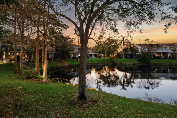 a lake view with a garden