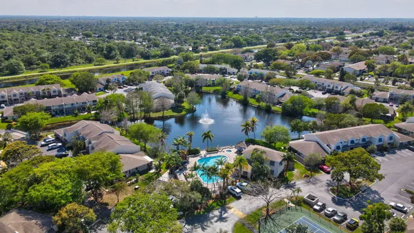 a view of a lake with a building in the background