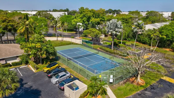 an aerial view of a house having yard