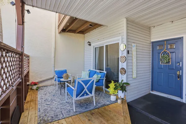 a view of living room and patio